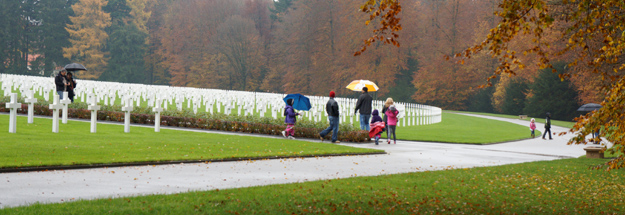 Photograph of Luxembourg American Cemetery, Veterans Day 2014, colorful clothing, by Peter Free.